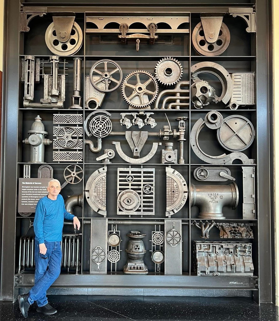 Mike Immler beside a historic Birmingham industrial display
