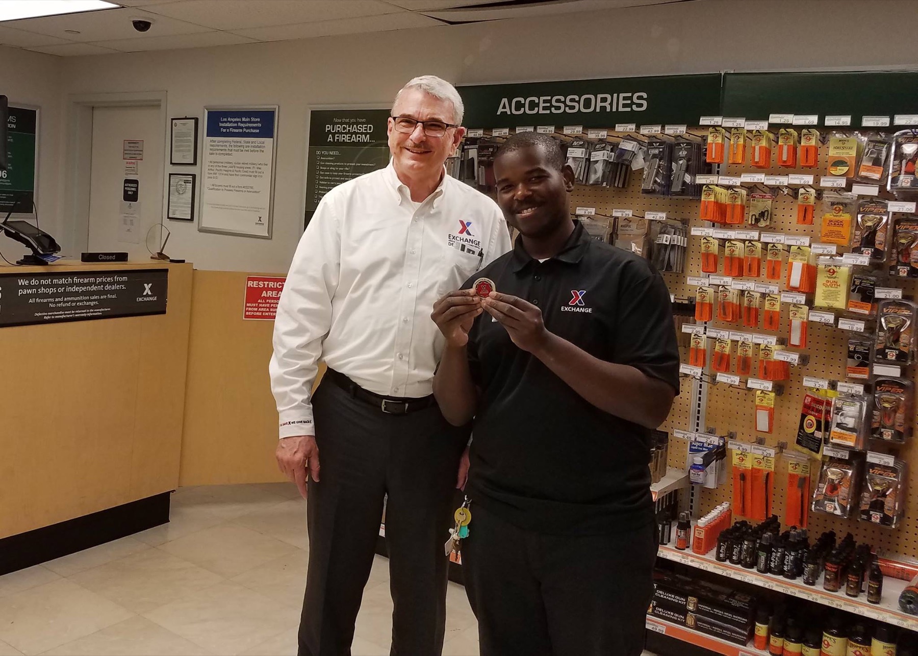 Mike Immler recognizing an Exchange employee for service