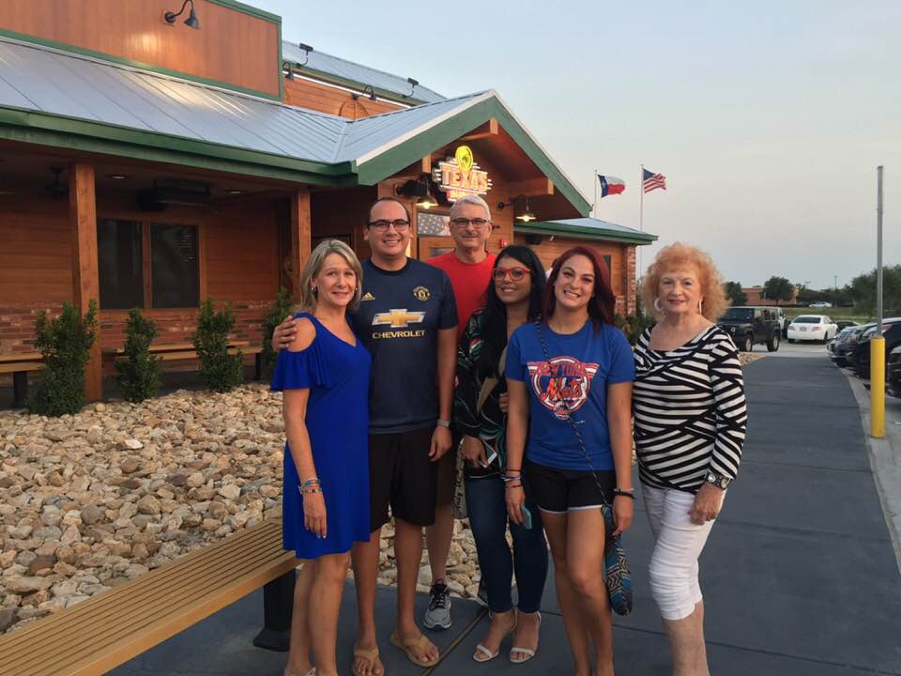 Mike Immler with family and friends outside a Texas Roadhouse
