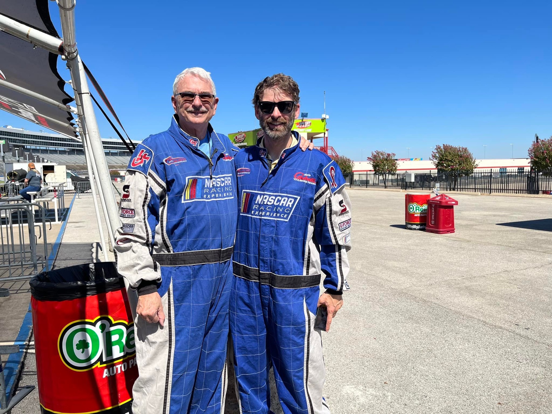Mike Immler and a family member in racing suits at Texas Motor Speedway