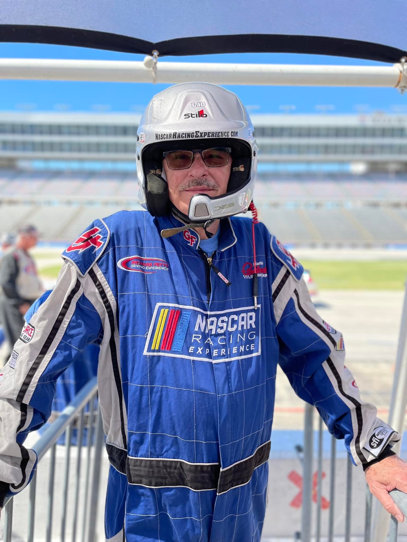 Mike Immler in a racing suit and helmet at Texas Motor Speedway